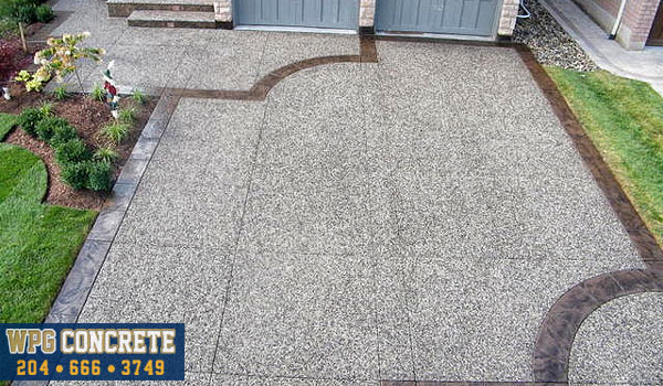 Completed exposed aggregate concrete driveway in Winnipeg, Manitoba