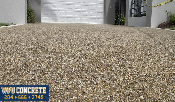 Completed exposed aggregate concrete sidewalk in Winnipeg, Manitoba