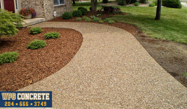 Completed exposed aggregate concrete driveway in Winnipeg, Manitoba