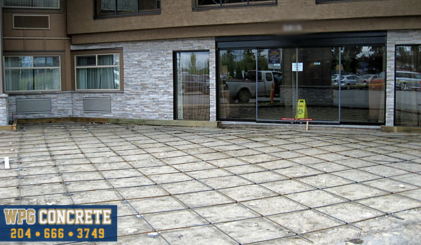 Rebar reinforcements in place for stamped concrete in Winnipeg, Manitoba