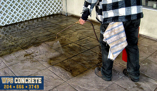 Sealcoating stamped concrete in Winnipeg, Manitoba